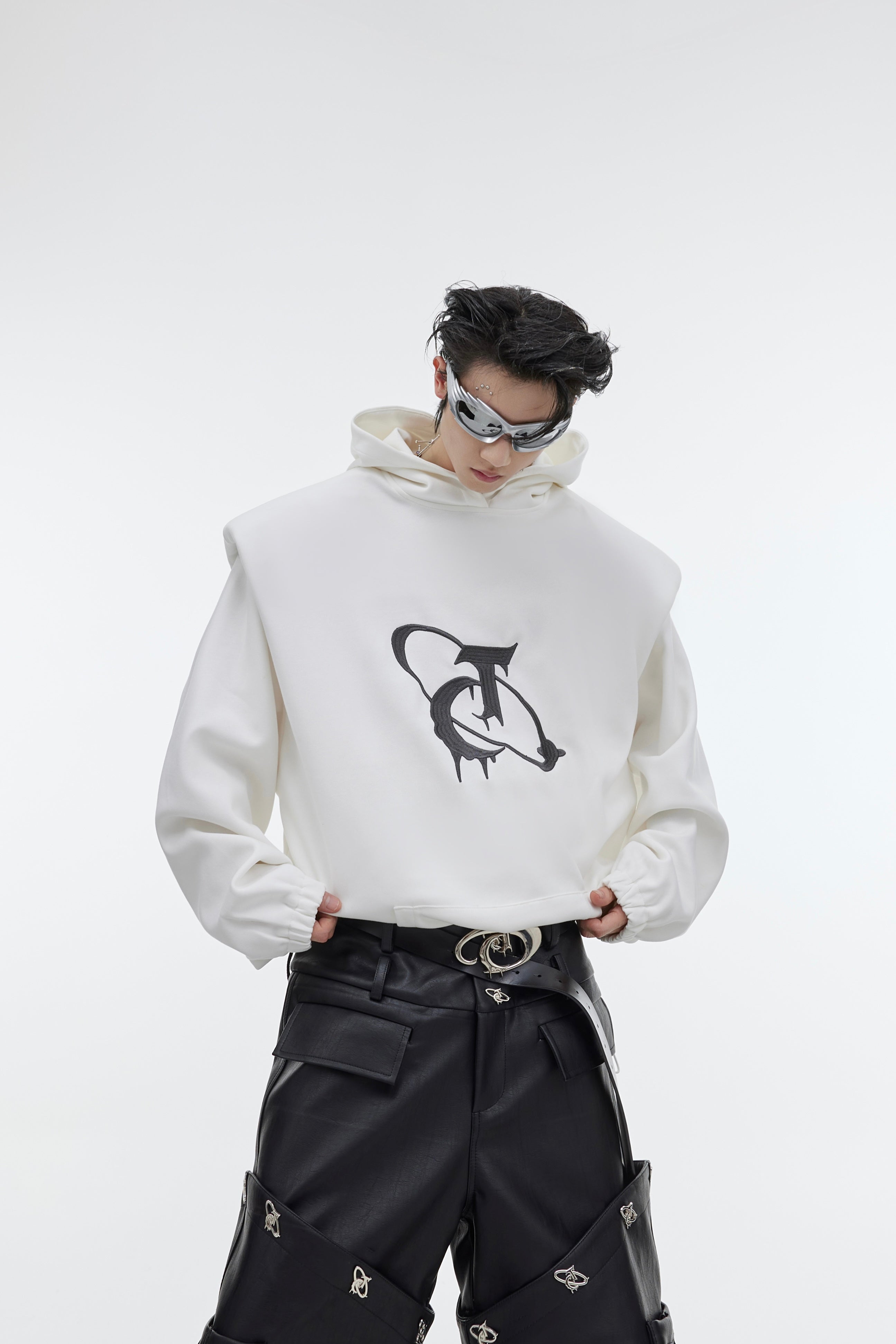 Elevate Your Style with the Deconstructed Pleated Shoulder Pad Hoodie in Luxurious Plush Fabric