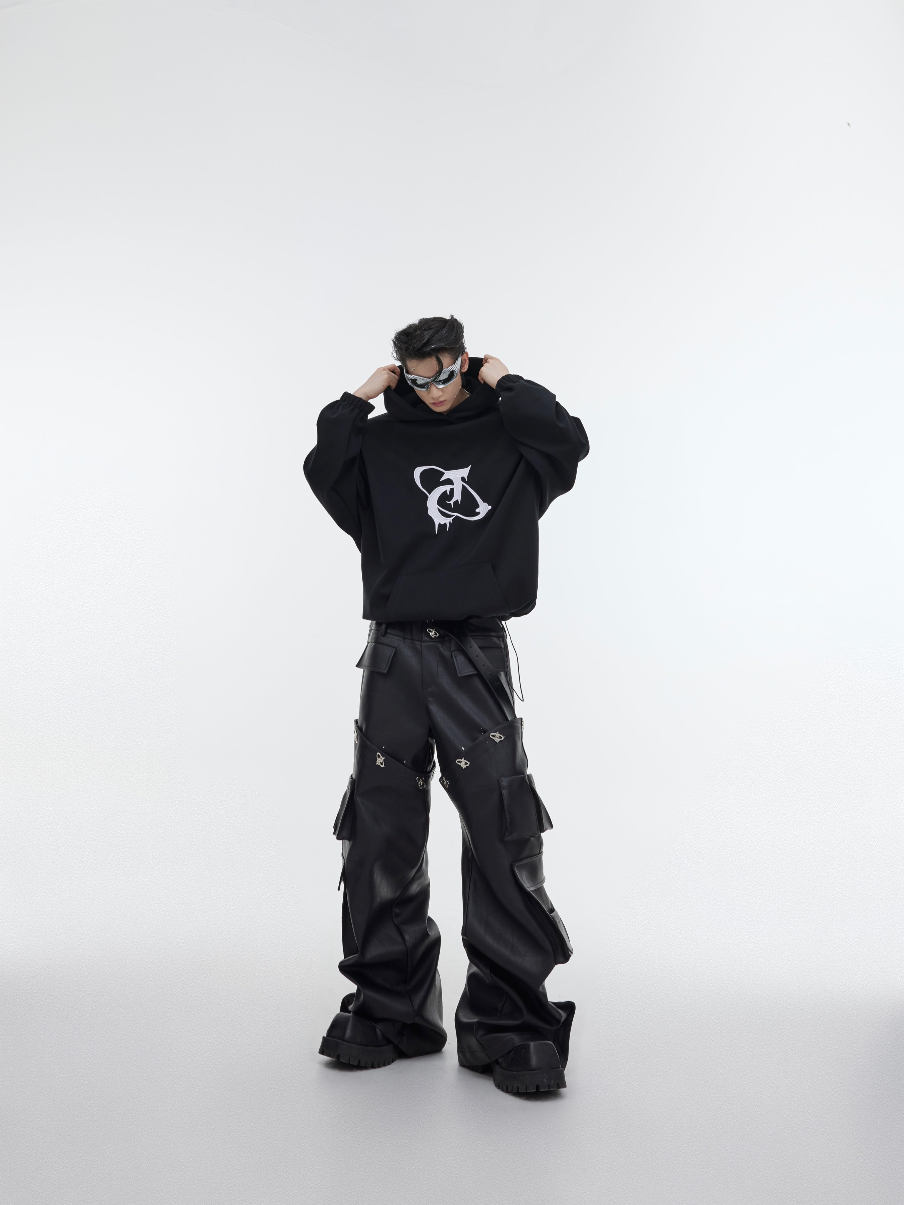 Elevate Your Style with the Deconstructed Pleated Shoulder Pad Hoodie in Luxurious Plush Fabric